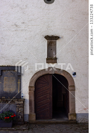 Esch-sur-Sure, Wiltz, Grand-Duche de Luxembourg, September 07, 2025, Gloomy doorway with serenity 133224738