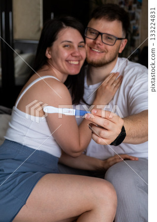 Happy Couple Celebrating Positive Pregnancy Test Happy Couple Celebrating Positive Pregnancy Test 133224831