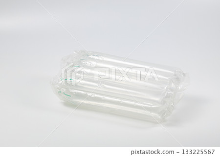 Close up plastic translucent air packaging, Plastic translucent packaging with air cushion. Inflatable air bag isolated on white background. 133225567
