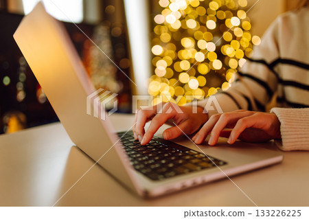 Close-up of hands working on a laptop keyboard. Freelance, online course. Shopping online. Close-up of hands working on a laptop keyboard. Freelance, online course. Shopping online. 133226225