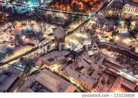 Aerial night View of Tallinn in winter, roofs are covered with snow, Christmas mood 133226686