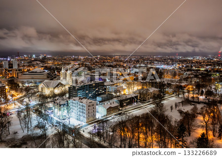 Aerial night View of Tallinn in winter, roofs are covered with snow, Christmas mood 133226689