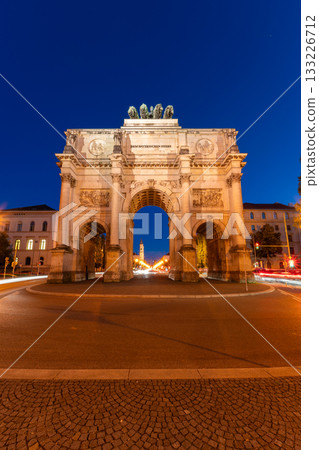 Siegestor Memorial Arch at Night and Car Light Trails. Munich, Bavaria, Germany Siegestor Memorial Arch at Night and Car Light Trails. Munich, Bavaria, Germany 133226712