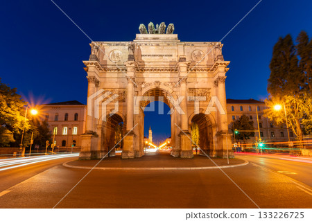 Siegestor Memorial Arch at Night and Car Light Trails. Munich, Bavaria, Germany Siegestor Memorial Arch at Night and Car Light Trails. Munich, Bavaria, Germany 133226725