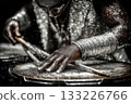 African American drummer performing with vibrant energy and dynamic rhythm 133226766