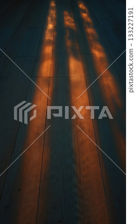 Golden Light Illuminating a Minimal Wooden Floor With Soft Shadows and a Peaceful Atmosphere 133227191