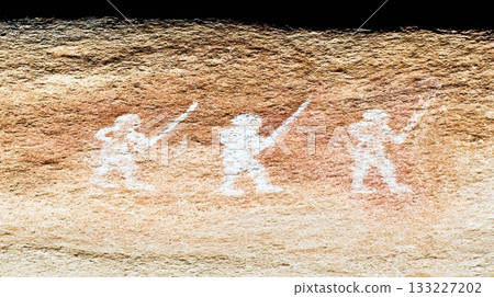 Primitive Human Figures Depicted With Spears in Ancient Rock Art From a Prehistoric Location Primitive Human Figures Depicted With Spears in Ancient Rock Art From a Prehistoric Location 133227202