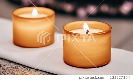 Yule Candles Create a Warm Glow on a Simple Altar During the Winter Season Yule Candles Create a Warm Glow on a Simple Altar During the Winter Season 133227304