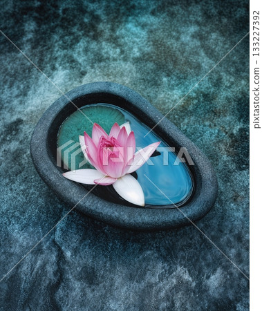 Beautiful Stone Bowl With Lotus Flower Beside Bodh at a Tranquil Setting Beautiful Stone Bowl With Lotus Flower Beside Bodh at a Tranquil Setting 133227392