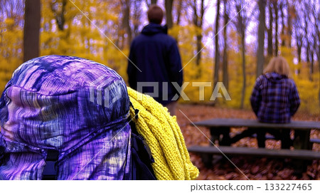 Hikers Pause in a Colorful Forest Surrounded by Autumn Leaves During a Thru Hike Adventure Hikers Pause in a Colorful Forest Surrounded by Autumn Leaves During a Thru Hike Adventure 133227465