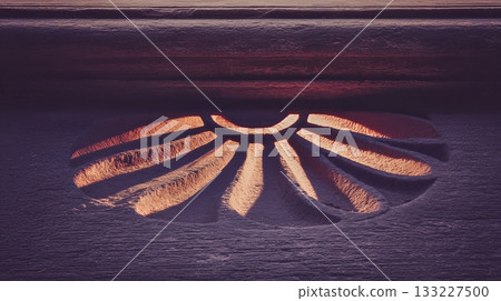 Sun Symbol Carved Into Sandstone Glows While the Sun Sets in an Ancient Location Sun Symbol Carved Into Sandstone Glows While the Sun Sets in an Ancient Location 133227500