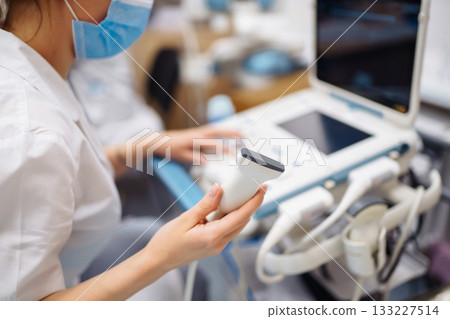 Ultrasound machine in the doctor's office in the clinic Diagnostics. Sonography. Pregnancy. 133227514