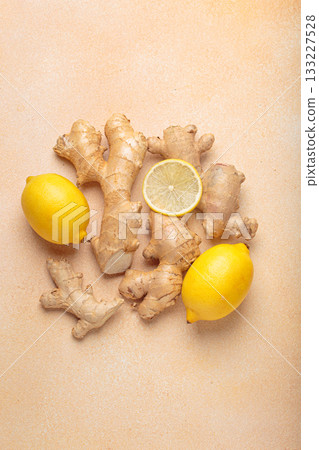 Ginger roots fresh lemons light background healthy remedy medicine immunity 133227528