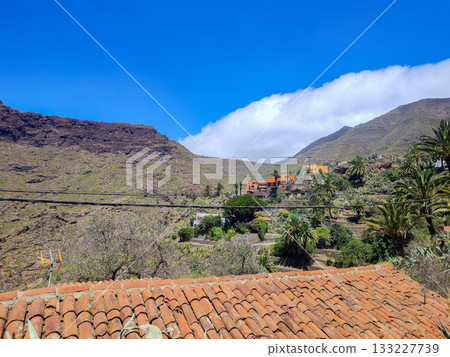 A Stunning and Breathtaking Scenic Mountain Landscape Under a Beautiful and Clear Blue Sky A Stunning and Breathtaking Scenic Mountain Landscape Under a Beautiful and Clear Blue Sky 133227739