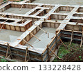 Construction work: pouring ready-mixed concrete 133228428