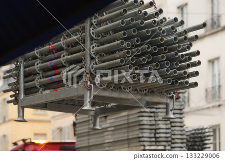 Row of stacked metal scaffolding at construction site Row of stacked metal scaffolding at construction site 133229006