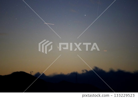 Comet Lemmon and sunset Comet Lemmon and sunset 133229523