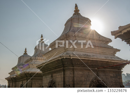 Small shrines in Pashupatinath in Kathmandu, Nepal. This temple is a Hindu temple dedicated to Pashupati, a form of Shiva. Small shrines in Pashupatinath in Kathmandu, Nepal. This temple is a Hindu temple dedicated to Pashupati, a form of Shiva. 133229876