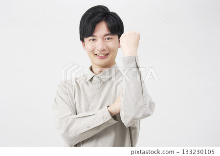 Male motivated pose, 20s, white background Male motivated pose, 20s, white background 133230105