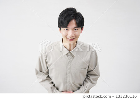 Male bowing, 20s, white background, looking at camera Male bowing, 20s, white background, looking at camera 133230110