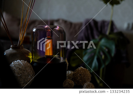 Indoors Decoration with modern lighted Air Humidification Aroma essential oil perfume fragrance. Scented home wellness wellbeing habit. Concept of feeling good spiritual health 133234235
