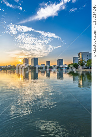Sunset scenery by the city lake 133234246