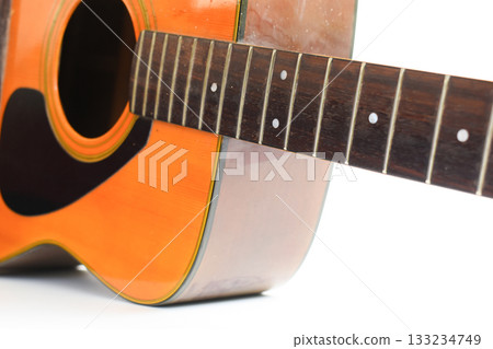 brown wood acoustic guitar isolated on white background 133234749