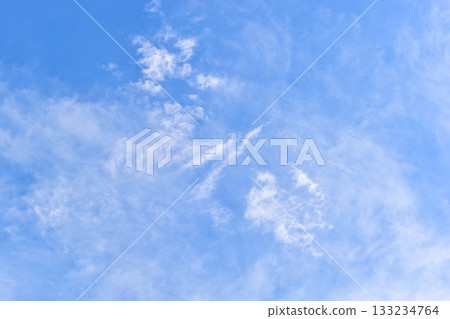 beautiful blue sky and white fluffy group of clouds with sunrise in the morning, natural background beautiful blue sky and white fluffy group of clouds with sunrise in the morning, natural background 133234764