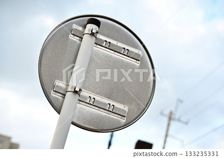 Behind the traffic sign 133235331