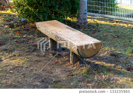 Park bench on an autumn evening Park bench on an autumn evening 133235983