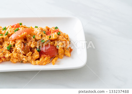 Stir-fried tomatoes with egg or Scrambled eggs with tomatoes 133237488