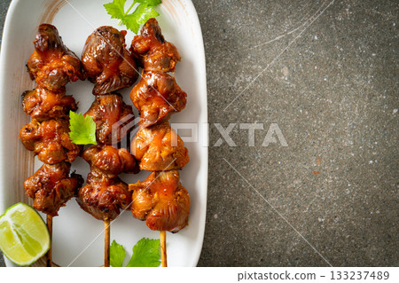 grilled chicken gizzard skewer with herbs and spices 133237489