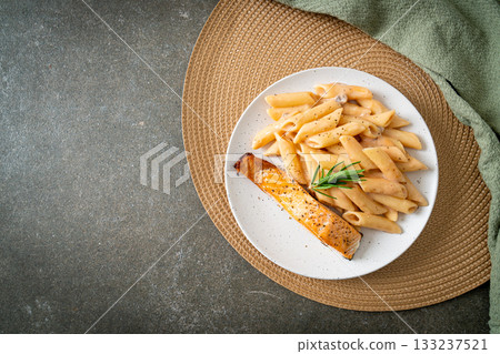 salmon with penne pasta cream sauce 133237521