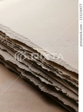 Stack of Handmade Deckle-Edge Paper Close-Up 133238477