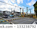 A Sagami Line train passing through Samukawa Daimon crossing and cars waiting for the train to pass. A Sagami Line train passing through Samukawa Daimon crossing and cars waiting for the train to pass. 133238792