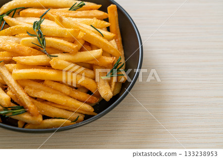 French fries with sour cream and ketchup 133238953