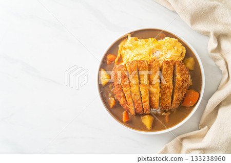 curry rice with fried pork cutlet and creamy omelet curry rice with fried pork cutlet and creamy omelet 133238960