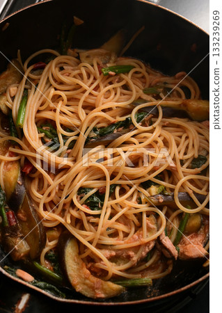 Cooking eggplant and tuna pasta in tomato sauce Cooking eggplant and tuna pasta in tomato sauce 133239269