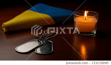 Ukrainian flag, dog tags, and candle symbolize remembrance and solidarity 133239890