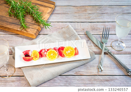 Hors d'oeuvres served on a white plate 133240557