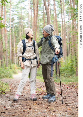 A couple hiking in Yatsugatake, Yamanashi A couple hiking in Yatsugatake, Yamanashi 133240999