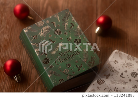 A book-shaped Christmas box gift for book lovers A book-shaped Christmas box gift for book lovers 133241893