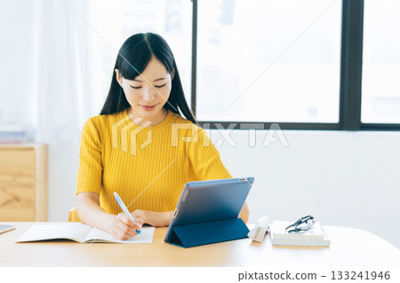 College students studying online in the living room 133241946