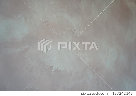Subtle mauve plaster texture with blended hues and an abstract, elegant finish, suitable for a background or design element. 133242145
