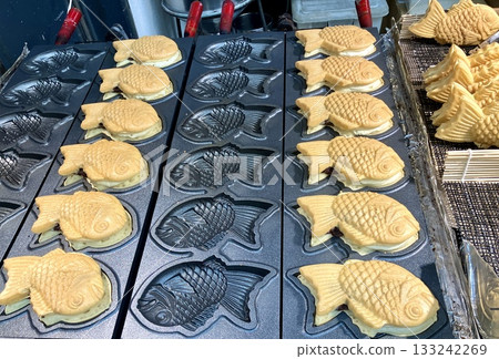 Taiyaki mass-produced in a taiyaki maker 133242269