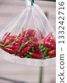 Takanotsume (chili peppers) drying in a net 133242716