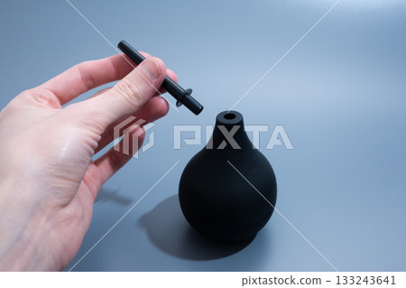 Black Rubber Enema Bulb on gray Background 133243641