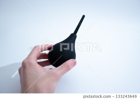 Black Rubber Enema Bulb on White Background 133243649