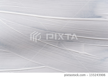 White paint on black construction paper 133243906