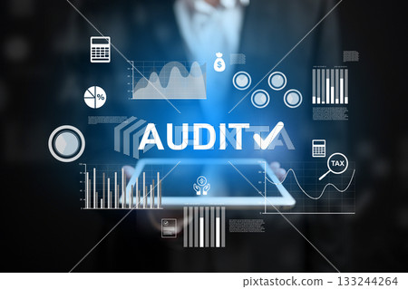 Important audit analysis taking place with graphs and digital tools in a professional setting Important audit analysis taking place with graphs and digital tools in a professional setting 133244264